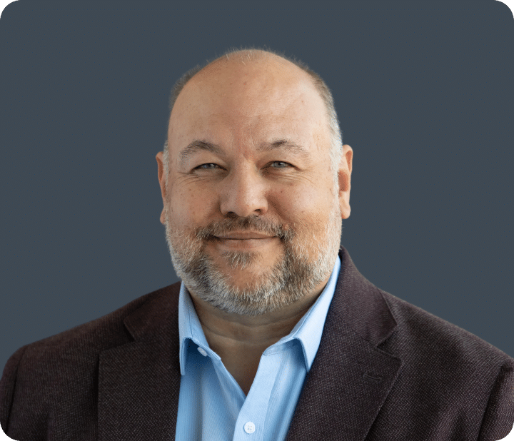 Jonathan Priestley red background | Leaders